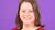 Marjolein Timmers in front of a purple background.