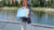 Ellen van Schoten by the pond on campus Woudestein with the SustainaBul award.