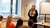 Woman in hijab gives a presentation to a group