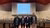 Transito board members stand in the aula