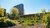 Garden at Woudestein campus with Tinbergen building in the background.