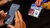 A participant scans a QR-code to partake in the Pornfessions research experiment at Lowlands 2024.