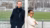 Scientists Jacco van Sterkenburg and Palesa Mashigo posing at a football field.