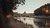 Concrete pathway beside body of water