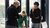 Three employees talking to each other at the Sustainability Summit 2024.