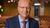 portrait photo of Koen Lenaerts in a conference room