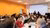 A group of conference attendees in Lodz, Poland, attend a workshop on Evaluating Societal Impact.