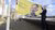 Guido Imbens standing in front of flag at the boompjesboulevard