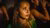 Girl in a crowd looking away