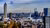 Skyline of Rotterdam with blue skies.