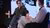 People sitting in chairs talking