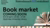 A green 'banner' with the announcement of the book market on it in black letters