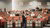 man talking in lecture hall