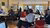 A working session where people are sitting at tables, chatting and presenting their "diamonds"