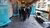 The cortège walks through the corridor of the Theil building to the Aula.