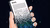 Generated image of a hand holding a phone