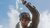 soldier holding a medical tube