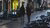 two people walking alone in the streets