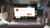 Laptop op bureau met YouTube-foutmelding op scherm, omringd door planten, mok en bureauaccessoires
