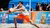 Tom Sonneville is playing beach volleyball