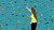 Woman in yellow shirt reaching toward a web of connected user avatars