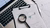 clipboard with magnifying glass and pen on top