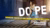 Vrouw met teksten "DOPE" en "Indringend theater en dans over de lijn die al onze levens verbindt". Met eveneens de logo's van "watwedoen.nl", "Lloyds Company" en "FORT-PORT".