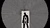 Black silhouette of walking figure in a white rectangle amid radiating black-and-white lines