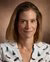 Anne Gielen smiling at the camera with a closed smile