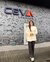 Tessie Schuurs die voor het logo van CEVA Logistics staat
