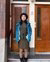 Hanh in front of the door - Hospi Housing