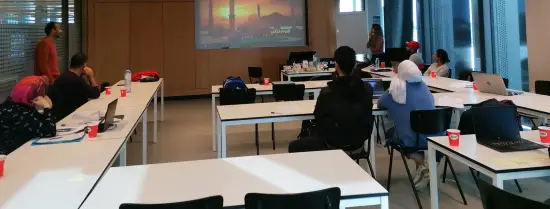 Person sharing their work to class with help of powerpoint