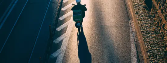 Guy on motorbike in sunlight