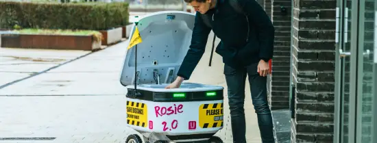 Student using Rosie 2.0 for delivery