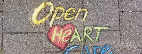 Open Heart cafe written with chalk 
